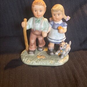 Charming Figurine with Boy, Girl, and Cat